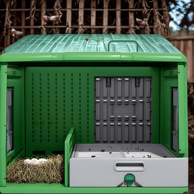 Inside of a green plastic chicken coop