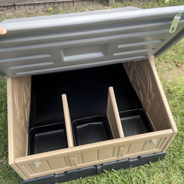 Open Beige plastic chicken coop.